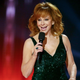 Image for article titled Reba McEntire Reminds Us to 'Wear Your Mask' and 'Stay Safe' After Coming Down With COVID